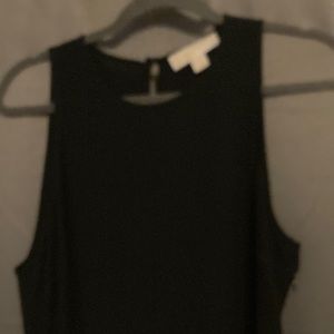 Fabulous Michael Kors handkerchief hem black dress. Worn once